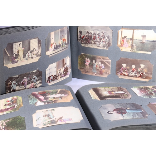 253 - Two albums of approximately 336 early 20th century Japanese coloured picture postcards depicting Jap... 