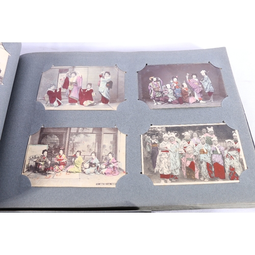 253 - Two albums of approximately 336 early 20th century Japanese coloured picture postcards depicting Jap... 