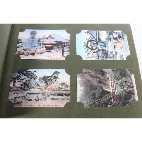 254 - An album containing approximately 500 early 20th century Japanese postcards most of topographical in... 