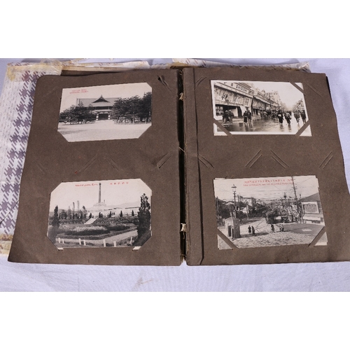 262 - An album containing approximately 130 postcards of Japanese interest including Shijo Bridge Kyoto, M... 