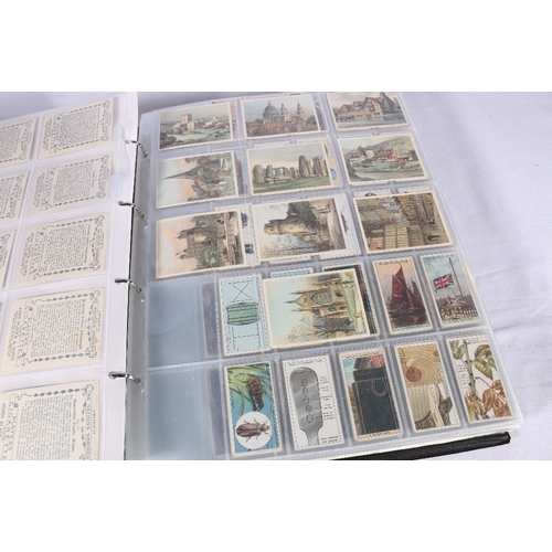 272 - An album of cigarette cards with more the 50 sets and partial sets featured including Wills Animallo... 