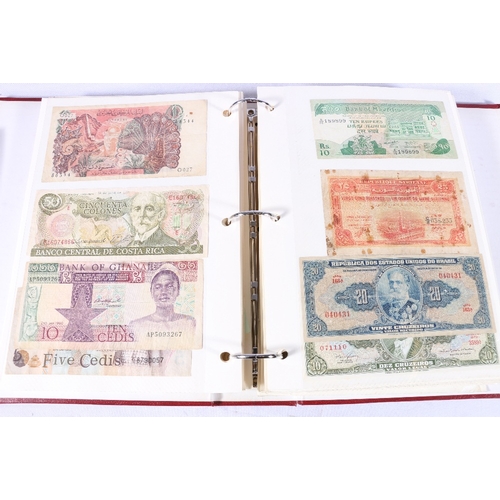 380 - Red folder containing nearly four hundred (400) world banknotes including SOUTH AFRICA, MEXICO, CYPR... 