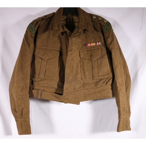 630 - Army unifrom dress khaki jacket or tunic with Intelligence Corps cloth shoulder title badges and med... 