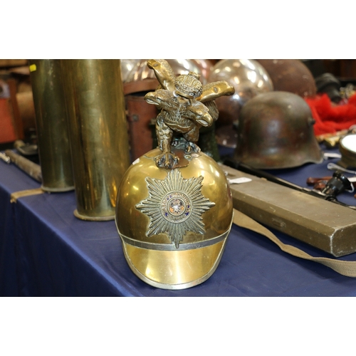 578 - Russian Imperial Garde brass helmet having star plate with enamel centre and double eagle crest fini... 