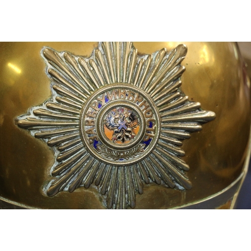 578 - Russian Imperial Garde brass helmet having star plate with enamel centre and double eagle crest fini... 