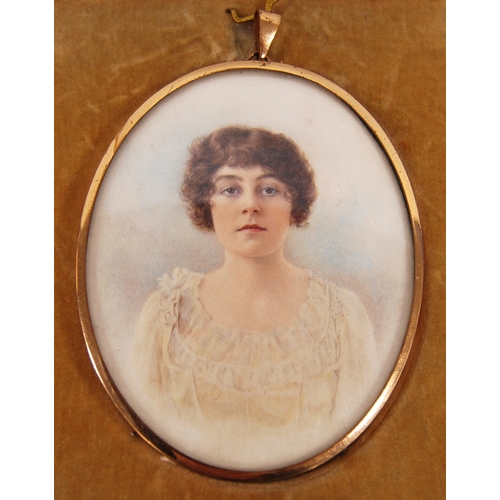 221 - Cased portrait miniature of a young lady, 9cm x 7cm.