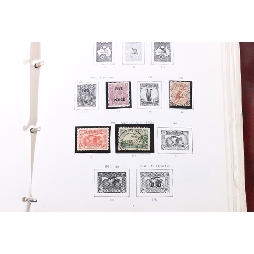 256 - A collection of mostly used world stamps within X albums including USA, IRELAND, AUSTRALIA, CANADA e... 