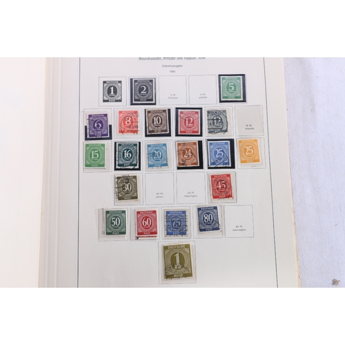 257 - An extensive used world stamp collection in 28 albums including GERMANY, COMMONWEALTH etc. 