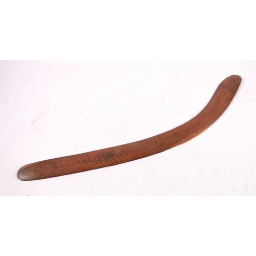 390 - Aboriginal boomerang with grooved fullers and adzed finish, 73cm long