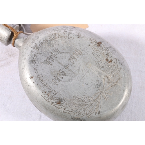 391 - WWI German aluminium water carrier flask decorated with nail work depicting eagle and 