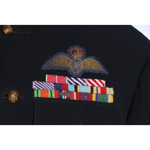 419 - British dress uniform black jacket with J G Plumb and Son label penned 