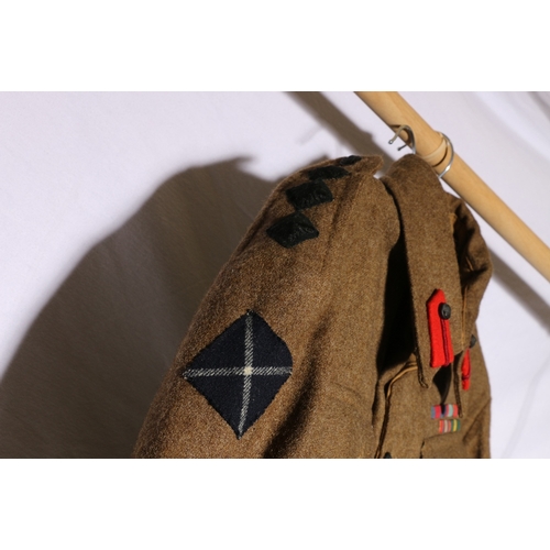 435 - British Army dress uniform khaki green tunic with N Berg label dated 1943 with black Cameronians (Sc... 