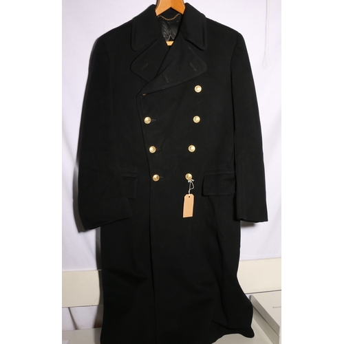 441 - British Naval dress uniform long black overcoat with shoulder boards having bullion crown, bullion e... 