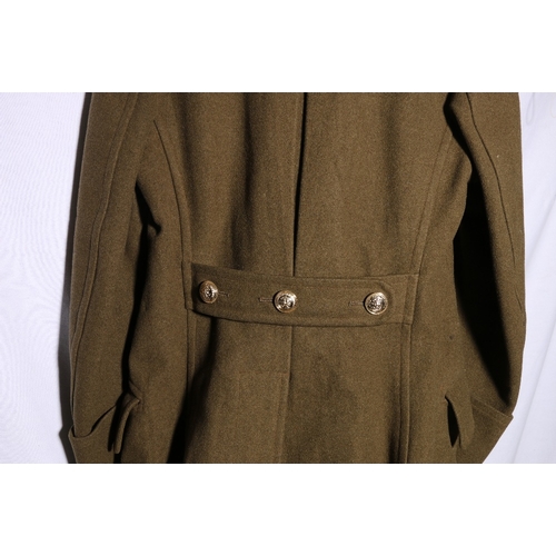 460 - British Army dress uniform khaki green long overcoat with The Royal Northumberland Fusiliers insigni... 