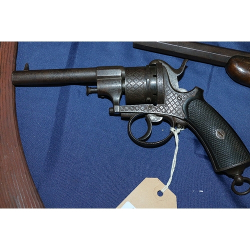 393 - 19th century pin fire revolver with hatched grip, 25cm long