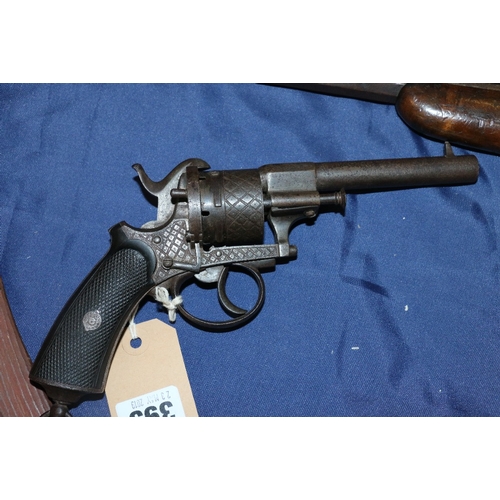 393 - 19th century pin fire revolver with hatched grip, 25cm long