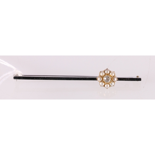 79 - White metal bar brooch set with approximately 0.15ct diamond encircled by eight round pearls, 3.27g,... 