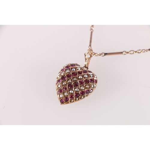 86 - 9ct yellow gold mourning locket pendent of heart shape set with diagonal rows of rubies and pearls u... 