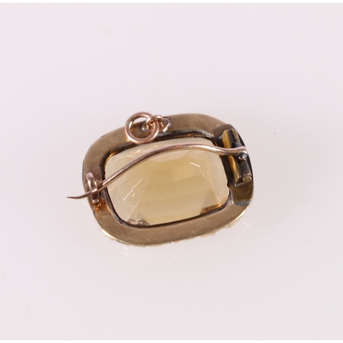 91 - Unhallmarked yellow metal combination brooch pendent set with central faceted citrine or Cairngorm f... 