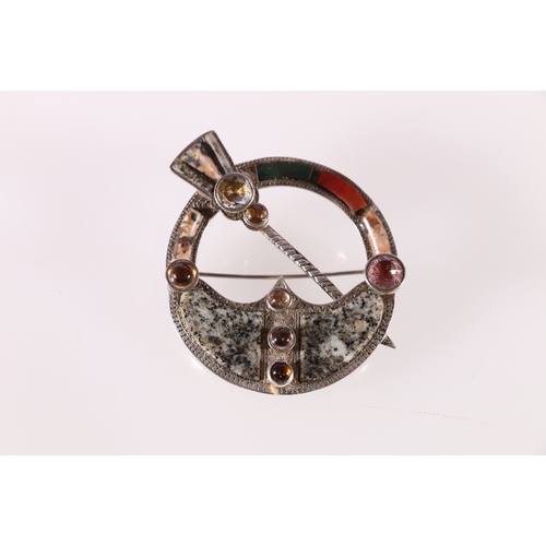 93 - Scottish pebble brooch in the form of a penannular set with Scottish agates and Cairngorms, lozenge ... 