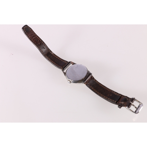 98 - Gents Ulysse Nardin Locle Suisse wristwatch on brown leather strap