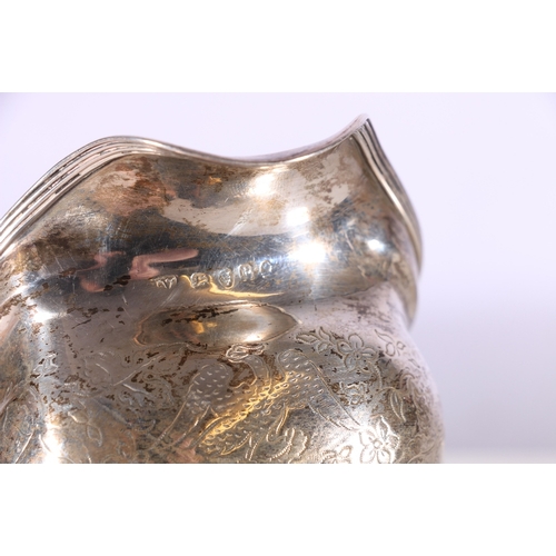 159 - George III silver cream jug with eagle and foliage decoration, makers marks rubbed possibly 