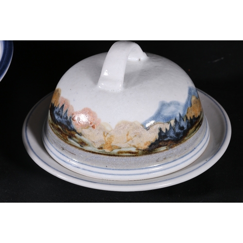 206 - Highland Stoneware bowled charger decorated with lily design 35cm diameter and a cheese dish and cov... 