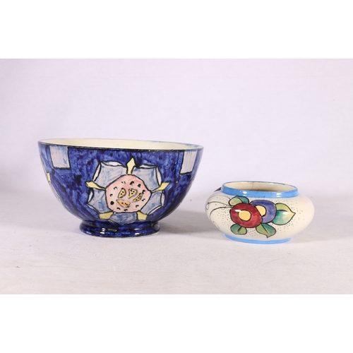 236 - Scottish Pottery bowl with handpainted floral designs on a blue ground, signed Dewar to base 19cm di... 