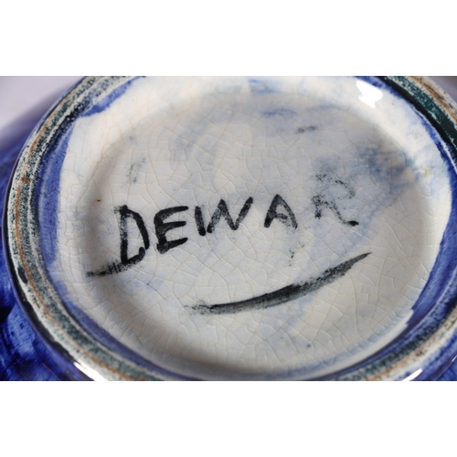 236 - Scottish Pottery bowl with handpainted floral designs on a blue ground, signed Dewar to base 19cm di... 