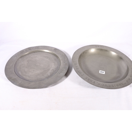 257 - Two pewter communion charger dishes or plates inscribed 