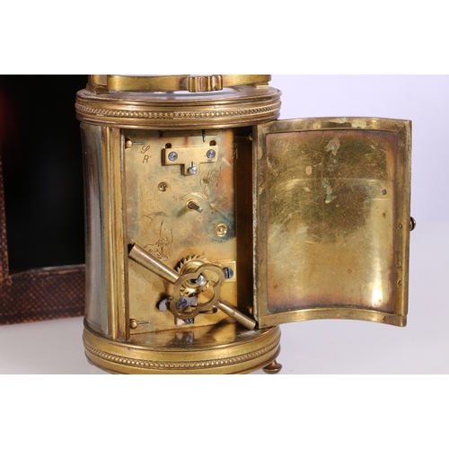 265 - 19th century French carriage clock of cylindrical form with enamel dial having Roman numeral chapter... 