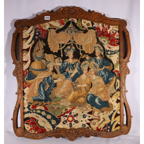 372 - Antique needlework panel within ornate carved wood frame, 80cm x 72cm 