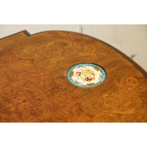 475 - 19th century walnut table with shaped edge, crossbanding, two circular Serves panels inset, shaped f... 