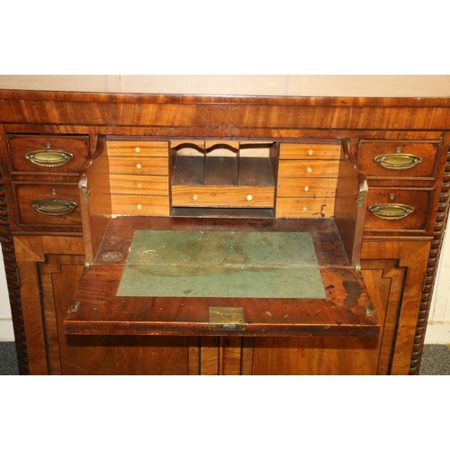 478 - 19th century mahogany secretaire chest having rounded corners above three frieze drawers over two pa... 