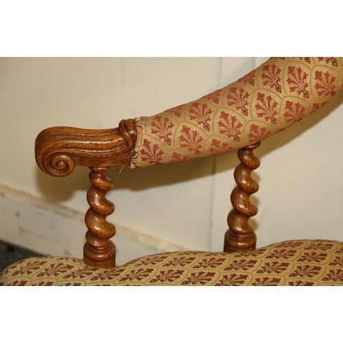 479 - Victorian oak framed yoke back chair upholstered in red and gold patterned fabric, the back rest rai... 