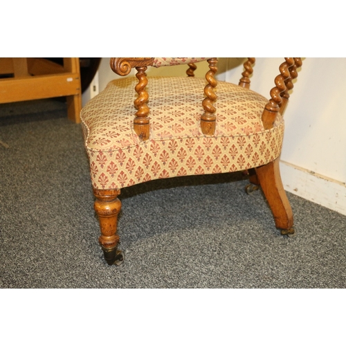 479 - Victorian oak framed yoke back chair upholstered in red and gold patterned fabric, the back rest rai... 