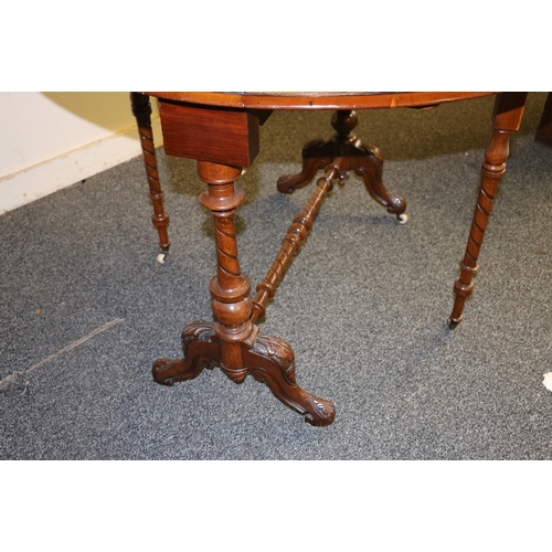 482 - Victorian walnut drop leaf table of oval shape with gate leg raised on carved cabriole supports term... 