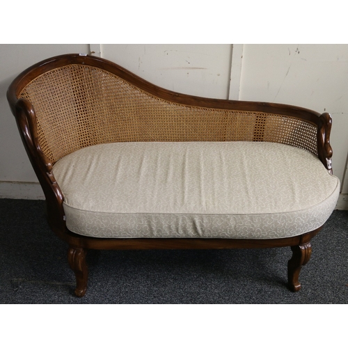 487 - Reproduction bergere chaise longue having swan neck and head arms, raised on cabriole supports, 131 ... 