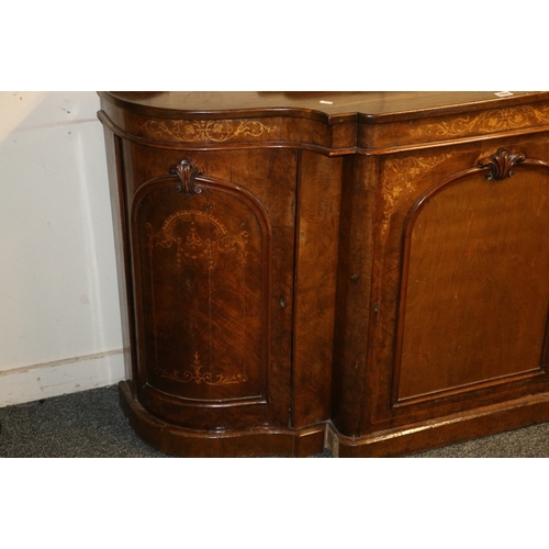 488 - Victorian walnut credenza of serpentine demi lune form having ledge back over three marquetry inlaid... 