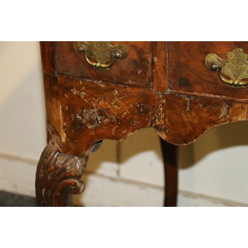 495 - 18th century walnut lowboy with crossbanded and inlaid top, pull out frieze writing slide over centr... 