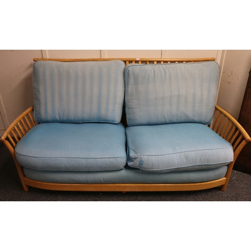 502 - Ercol blonde oak three piece lounge suite comprising sofa and two arm chairs