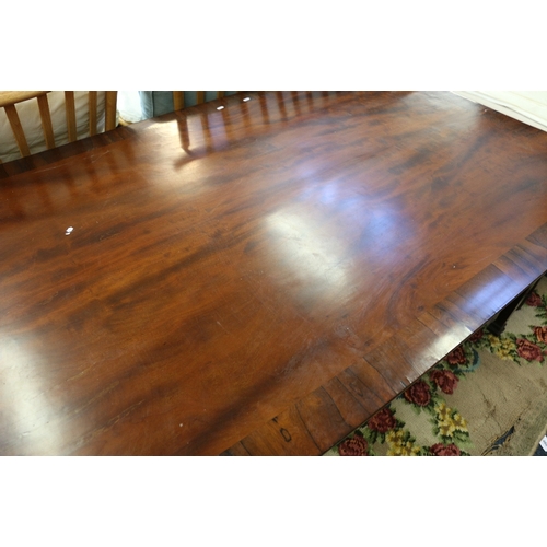 466 - Late Georgian mahogany dining table with rosewood cross banding, 181cm x 114cm.