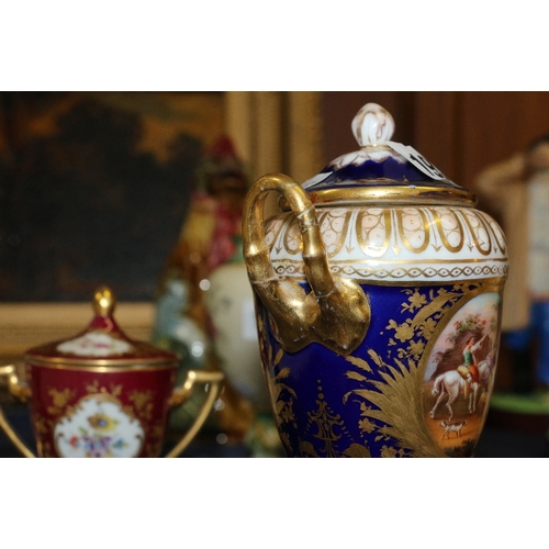 193 - Royal Vienna porcelain twin handled lidded urn and cover decorated with two vignettes depicting figu... 