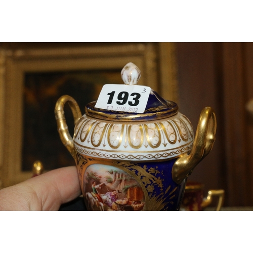 193 - Royal Vienna porcelain twin handled lidded urn and cover decorated with two vignettes depicting figu... 