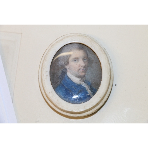 275 - A small portrait miniature of a gentleman in a blue jacket, signed lower right with initials S.C 176... 