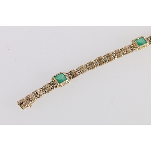 112 - 18ct gold bracelet set with five faceted square cut emeralds, 8.2g