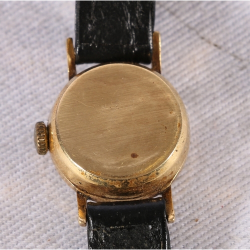 128 - Ladies 18ct gold cased Longines automatic wrist watch with black leather bracelet