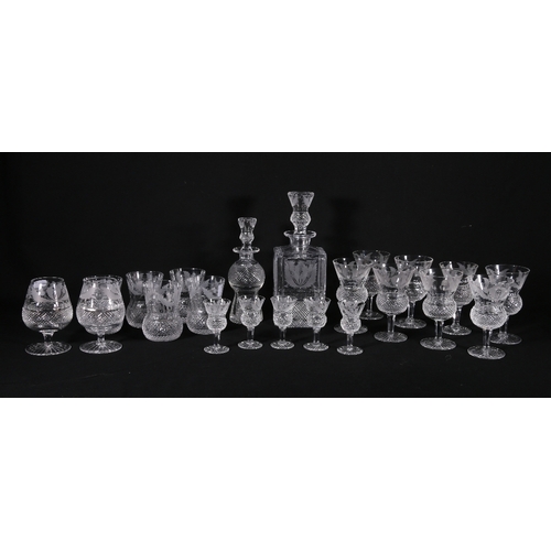 226 - A twenty-two piece set of etched thistle and hobnail cut glassware including two decanters, set of e... 