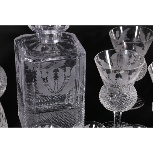 226 - A twenty-two piece set of etched thistle and hobnail cut glassware including two decanters, set of e... 