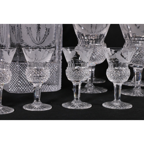 226 - A twenty-two piece set of etched thistle and hobnail cut glassware including two decanters, set of e... 